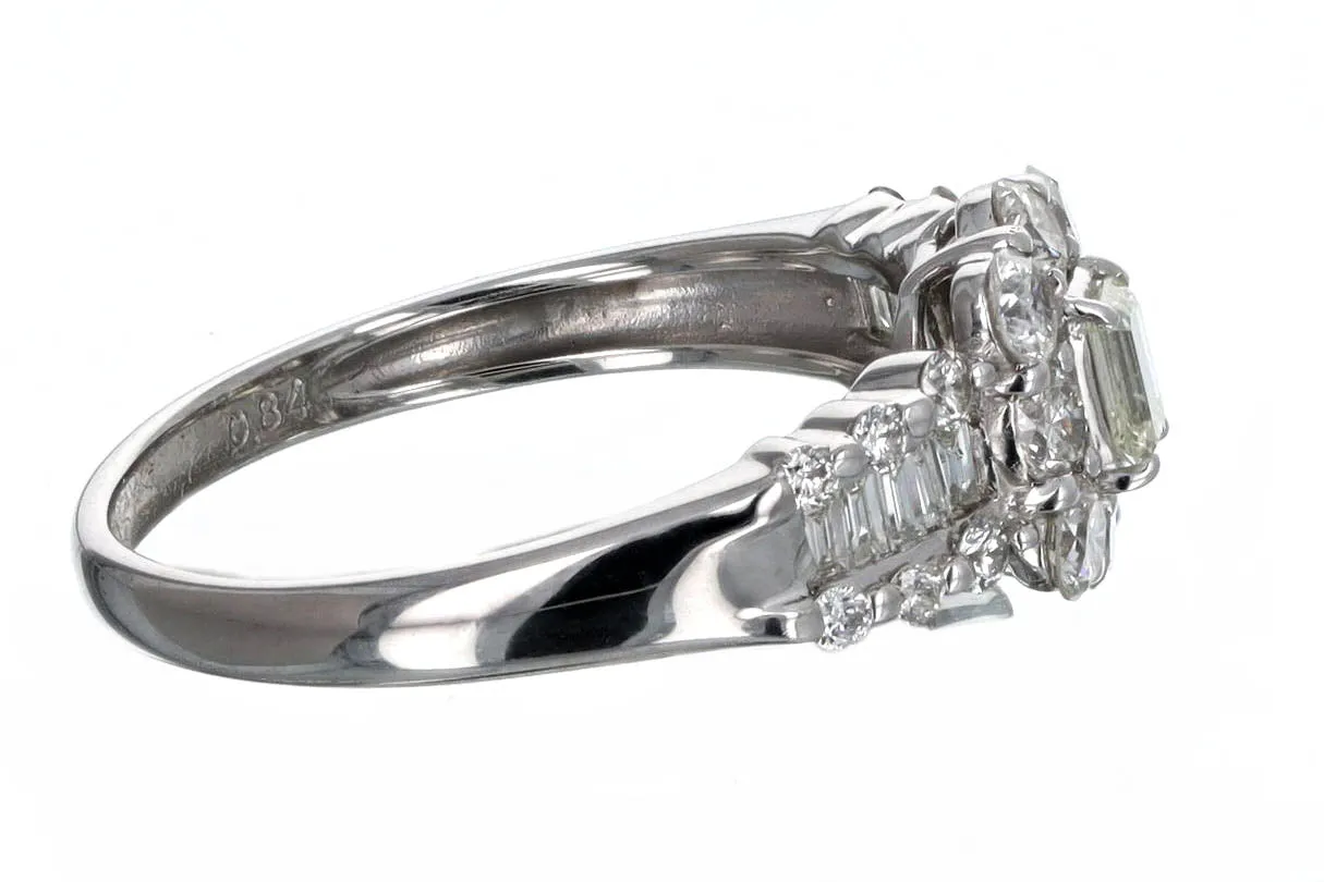 0.17 Carat Emerald Cut Diamond Halo Engagement Ring in Platinum