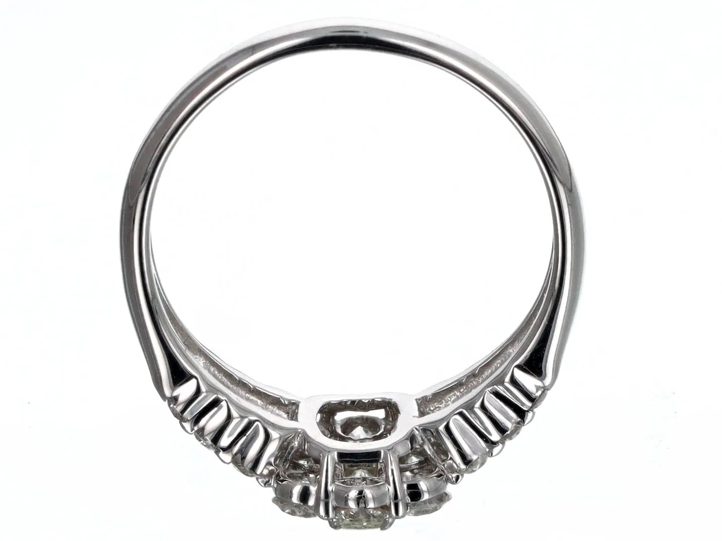 0.17 Carat Emerald Cut Diamond Halo Engagement Ring in Platinum