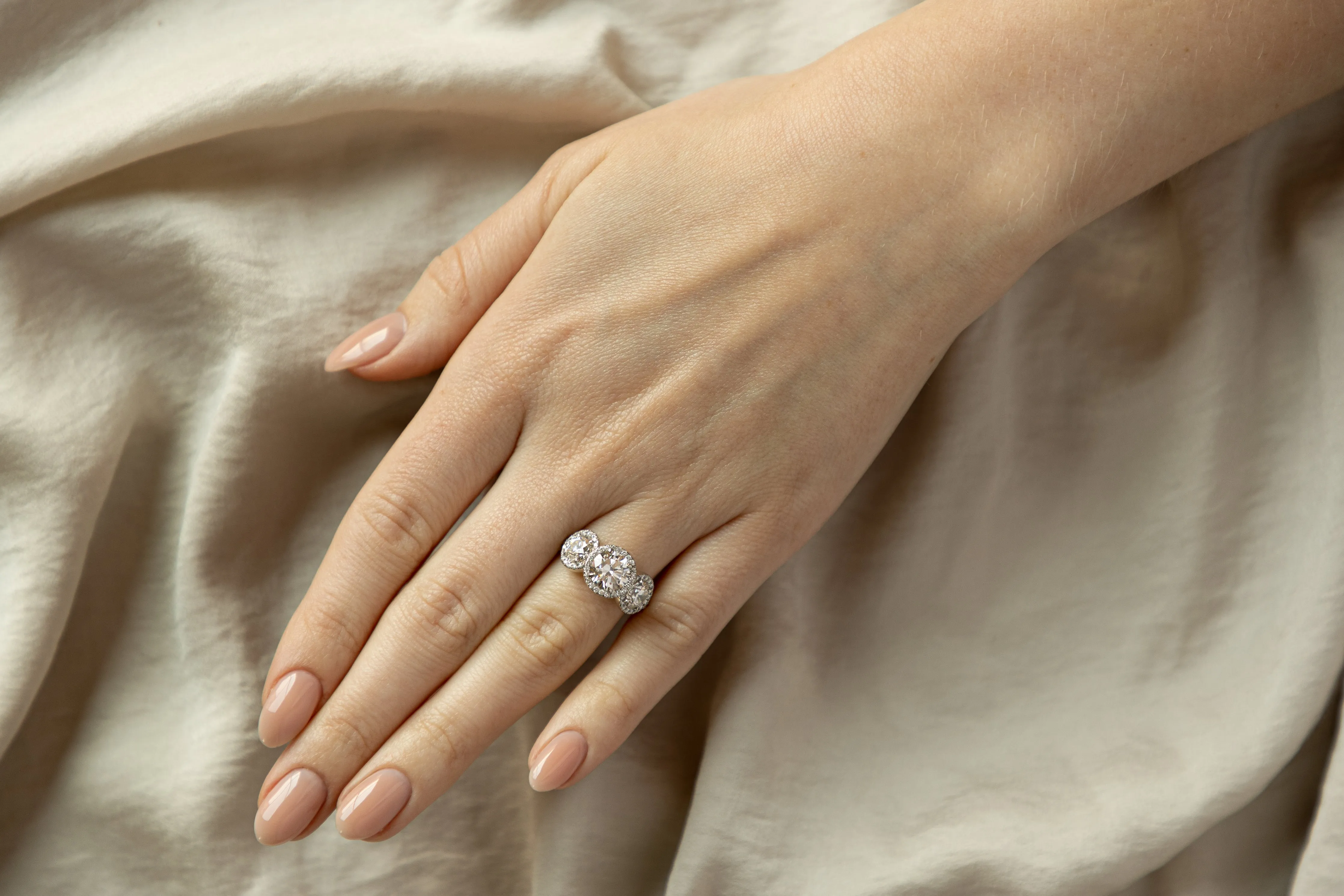 1.47 Carat Round Brilliant Diamond Three Stone Halo Engagement Ring in Platinum GIA Certified