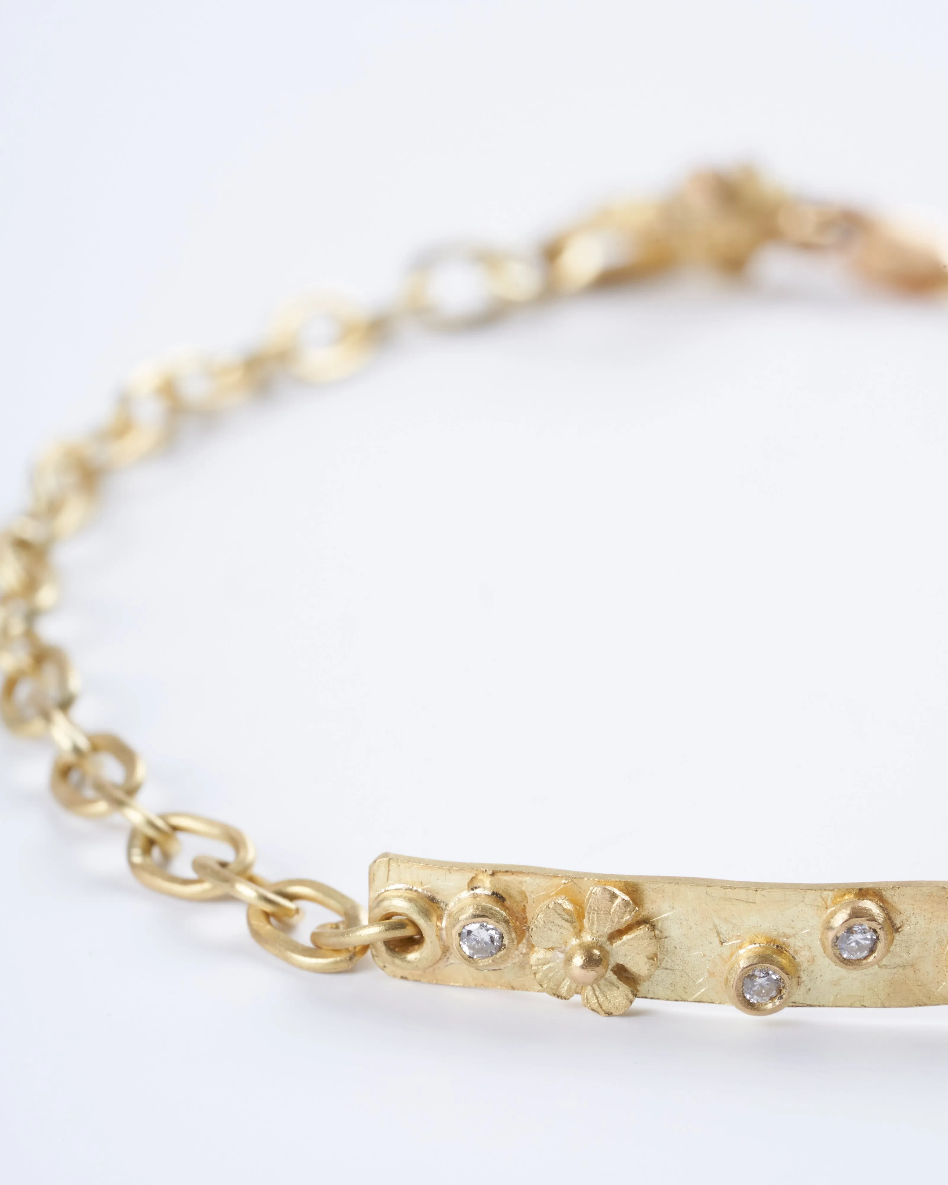 18k yellow gold and white diamonds