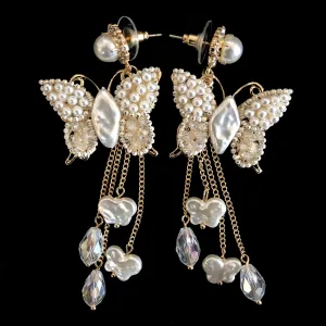 A PAIR OF ROMANTIC FAUX PEARL BUTTERFLY EARRINGS