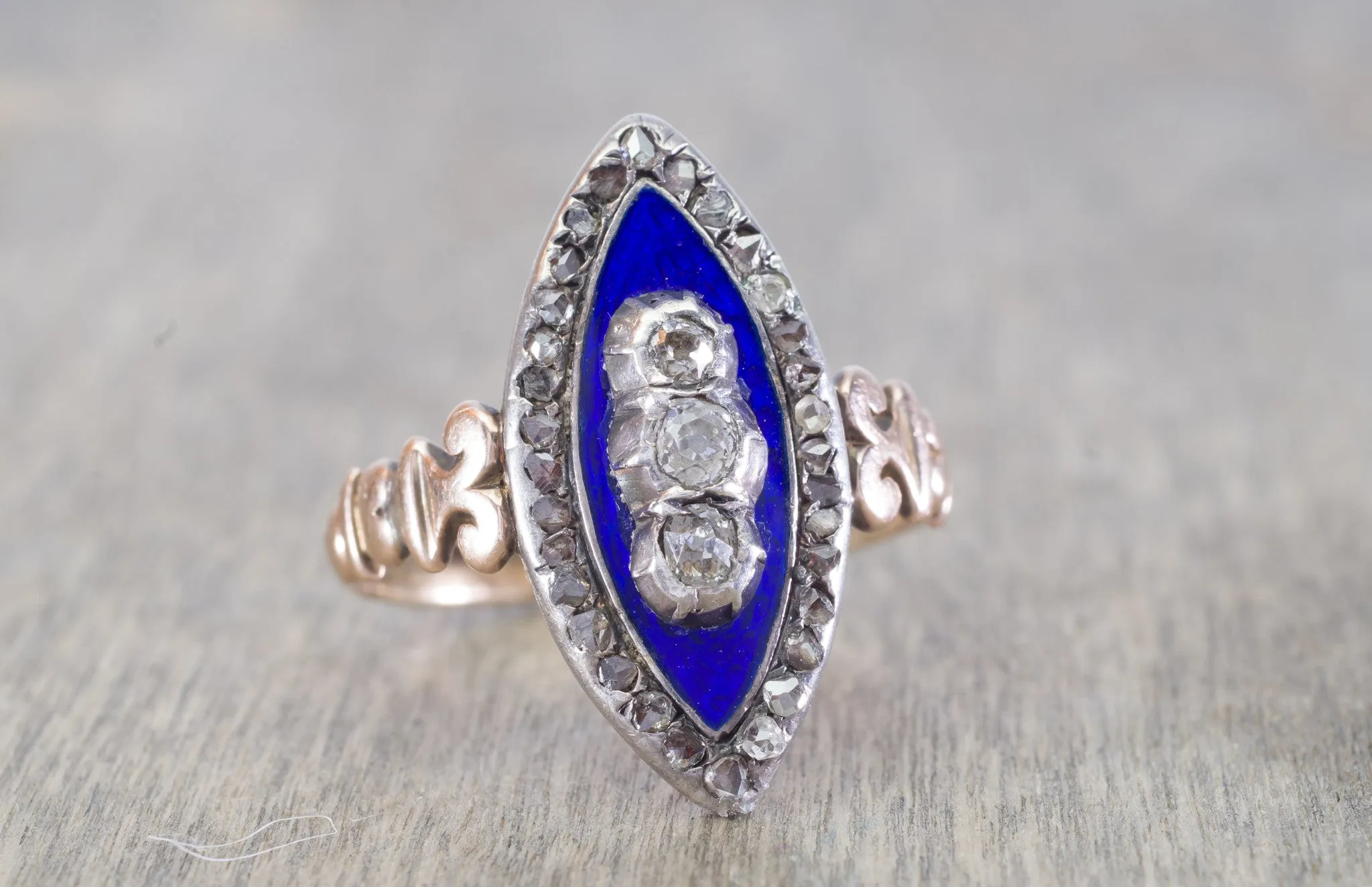 ANTIQUE ENAMEL OLD MINE CUT AND ROSE CUT DIAMOND NAVETTE STYLE RING