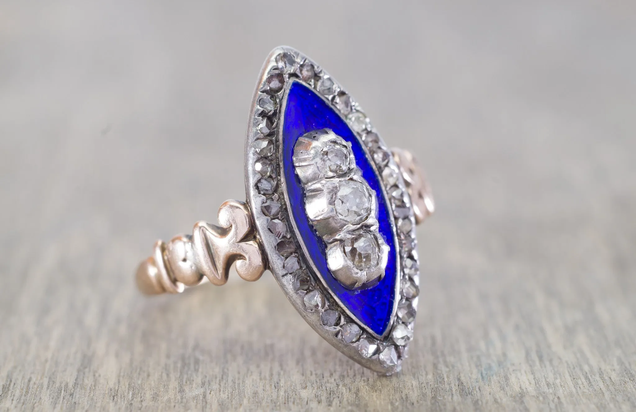 ANTIQUE ENAMEL OLD MINE CUT AND ROSE CUT DIAMOND NAVETTE STYLE RING