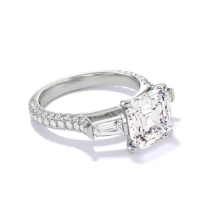 ASSCHER CUT DIAMOND ENGAGEMENT RING WITH A BAGUETTE FLANK THREE PHASES TRIPLE PAVE SETTING IN PLATINUM