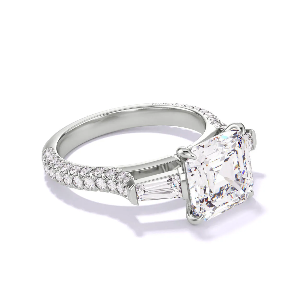 ASSCHER CUT DIAMOND ENGAGEMENT RING WITH A BAGUETTE FLANK THREE PHASES TRIPLE PAVE SETTING IN PLATINUM