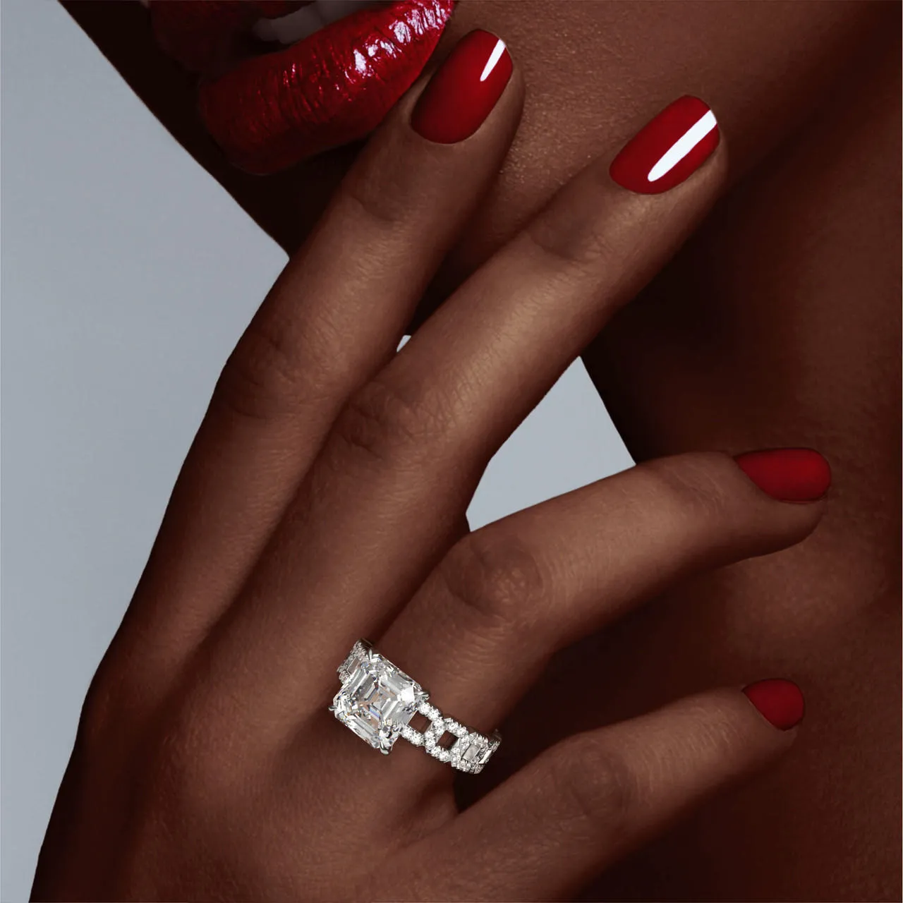 ASSCHER CUT DIAMOND ENGAGEMENT RING WITH A CLASSIC 4 PRONG 16 PAVE LINKS SETTING IN PLATINUM