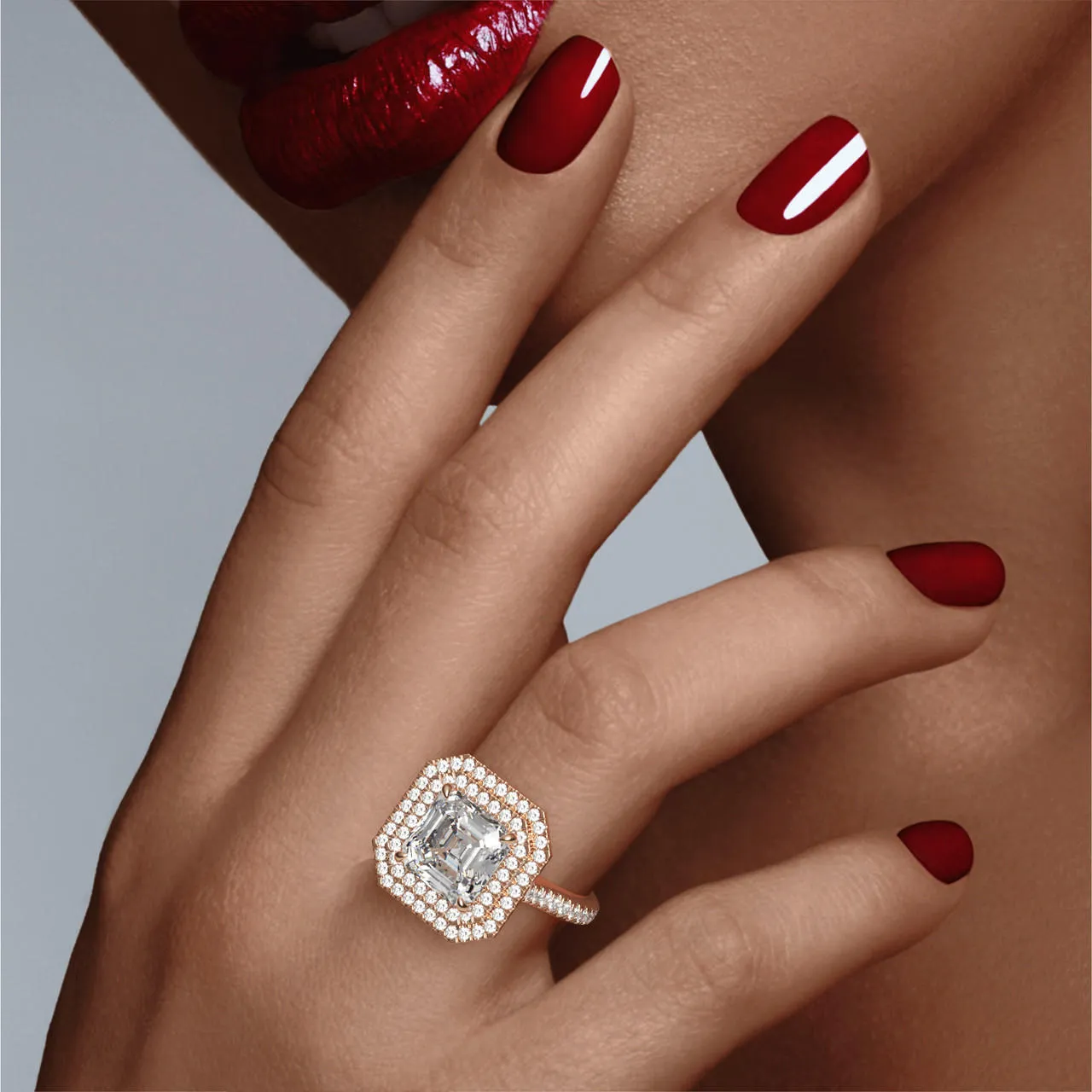 ASSCHER CUT DIAMOND ENGAGEMENT RING WITH A DOUBLE HALO THREE PHASES PAVE SETTING IN 18K ROSE GOLD