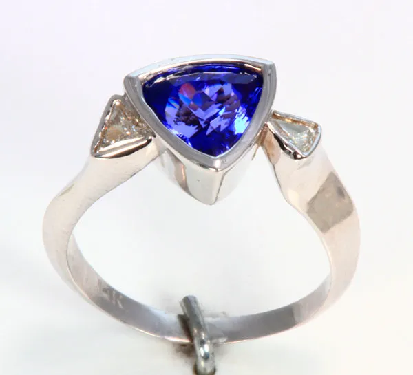 Beautiful Trilliant Tanzanite Ring With Trilliant Diamonds