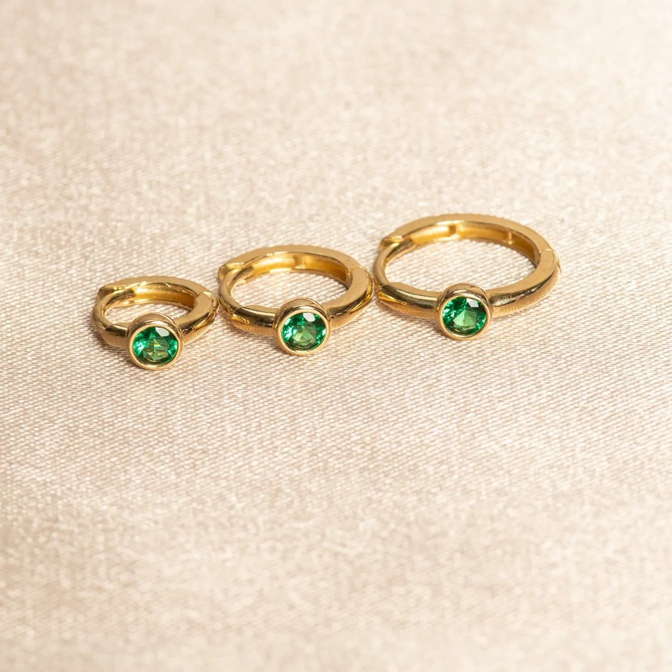 Bezel Set Emerald Huggie in  Gold