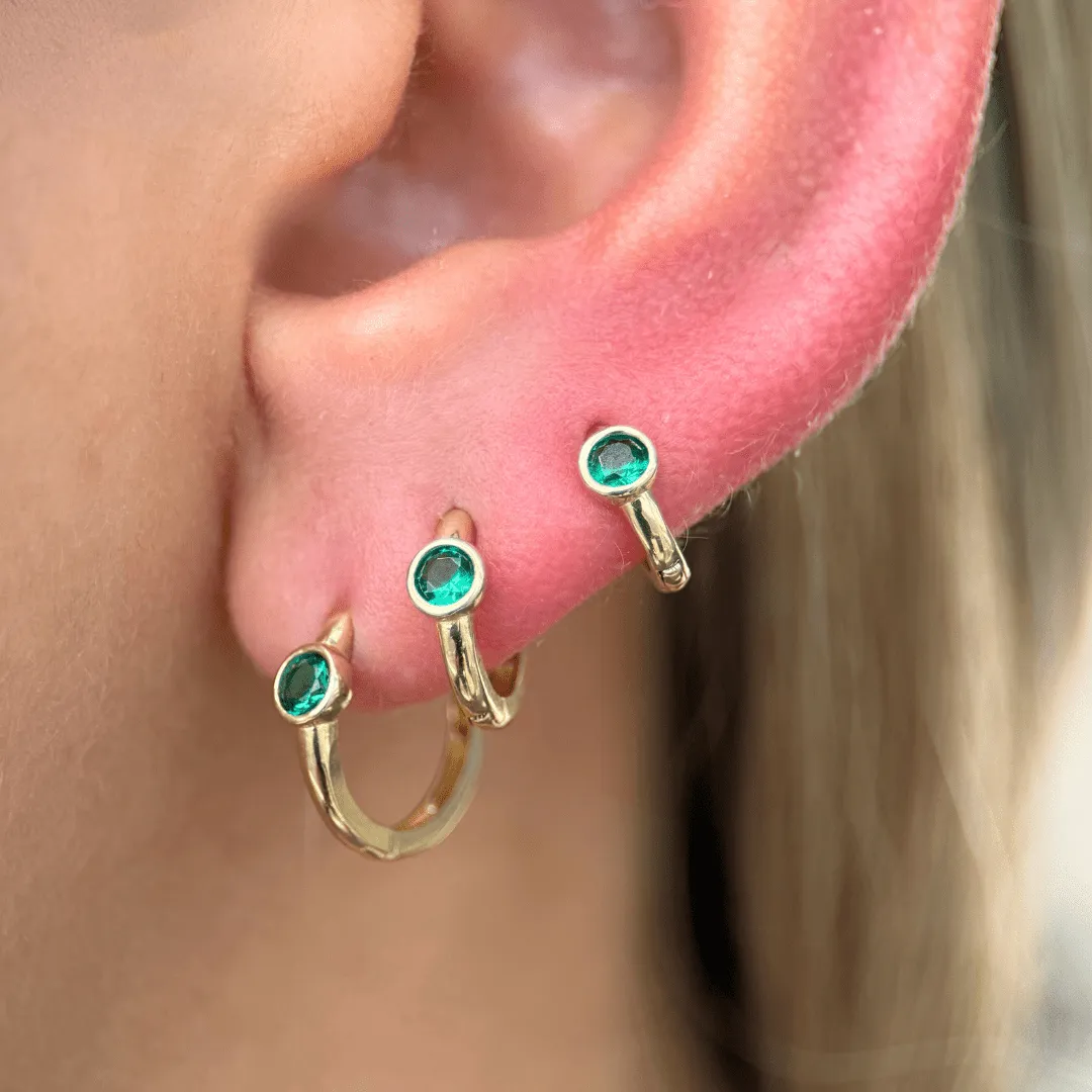 Bezel Set Emerald Huggie in  Gold