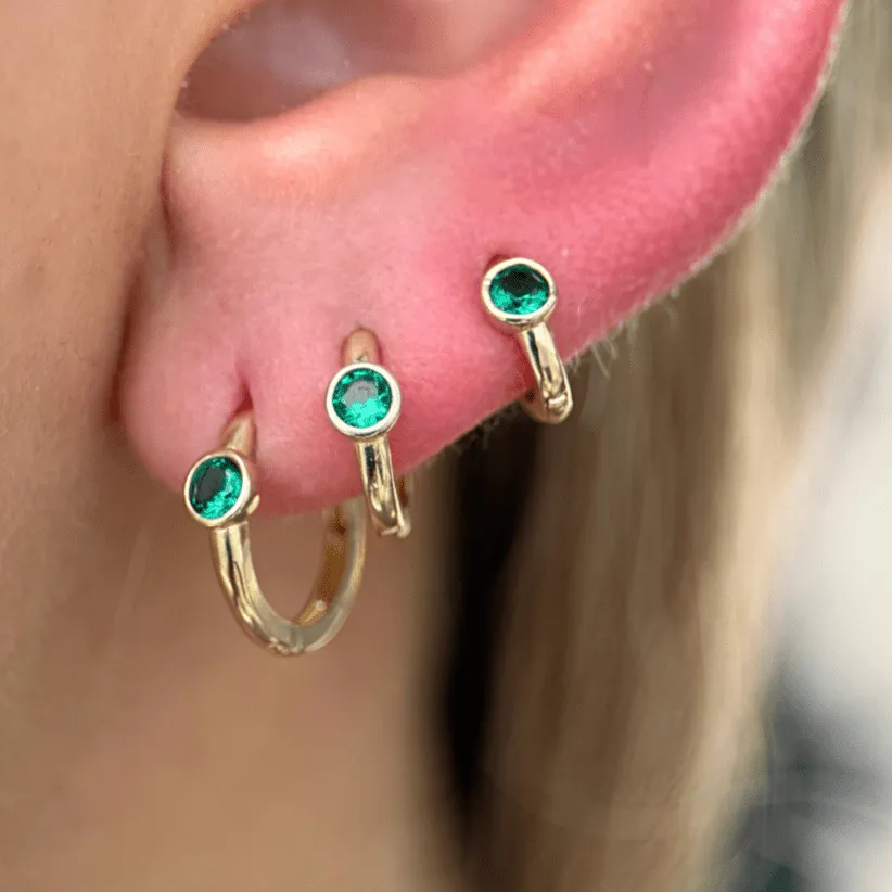 Bezel Set Emerald Huggie in  Gold