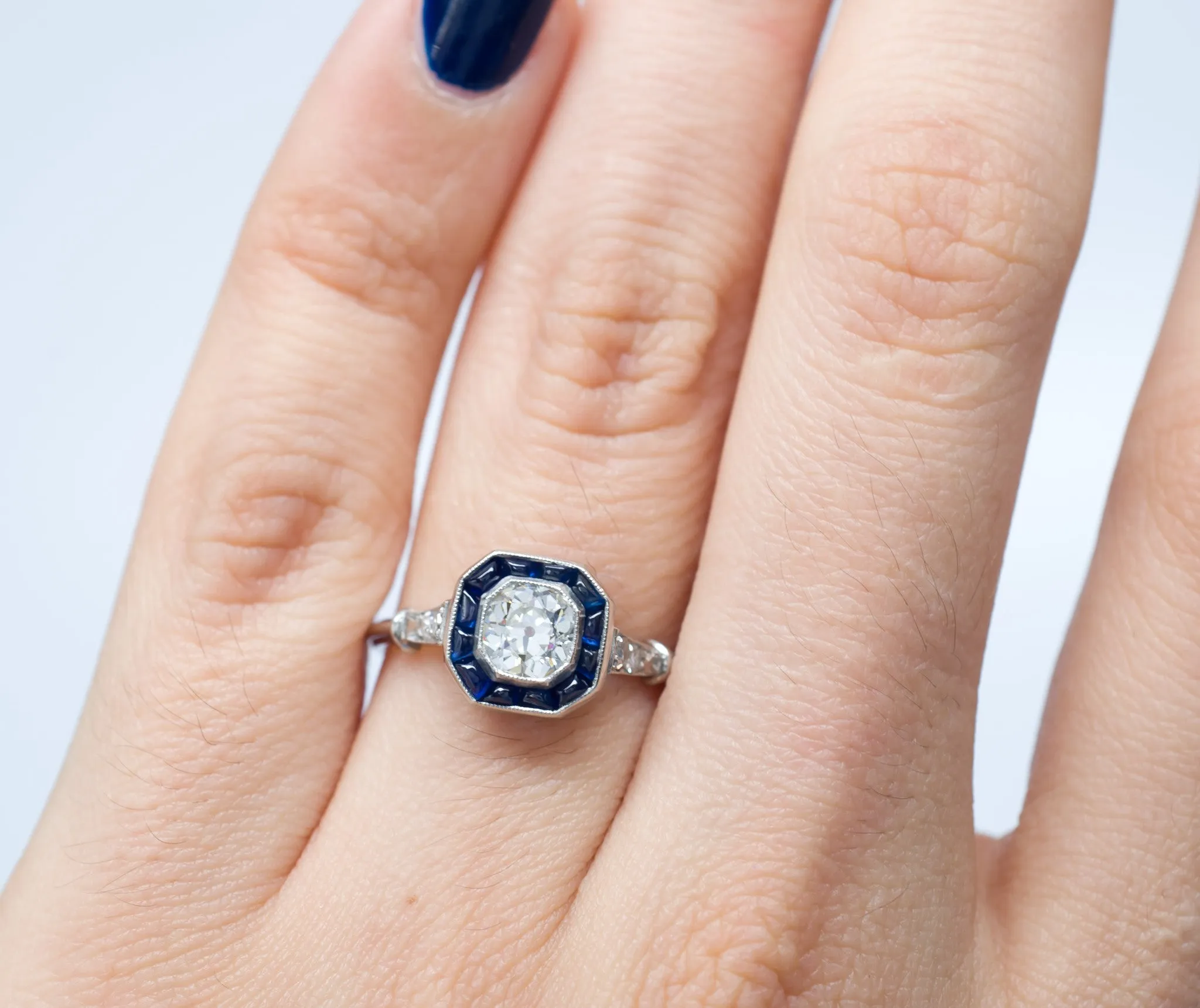 CABOCHON CUT SAPPHIRE AND OLD MINE CUT DIAMOND TARGET RING