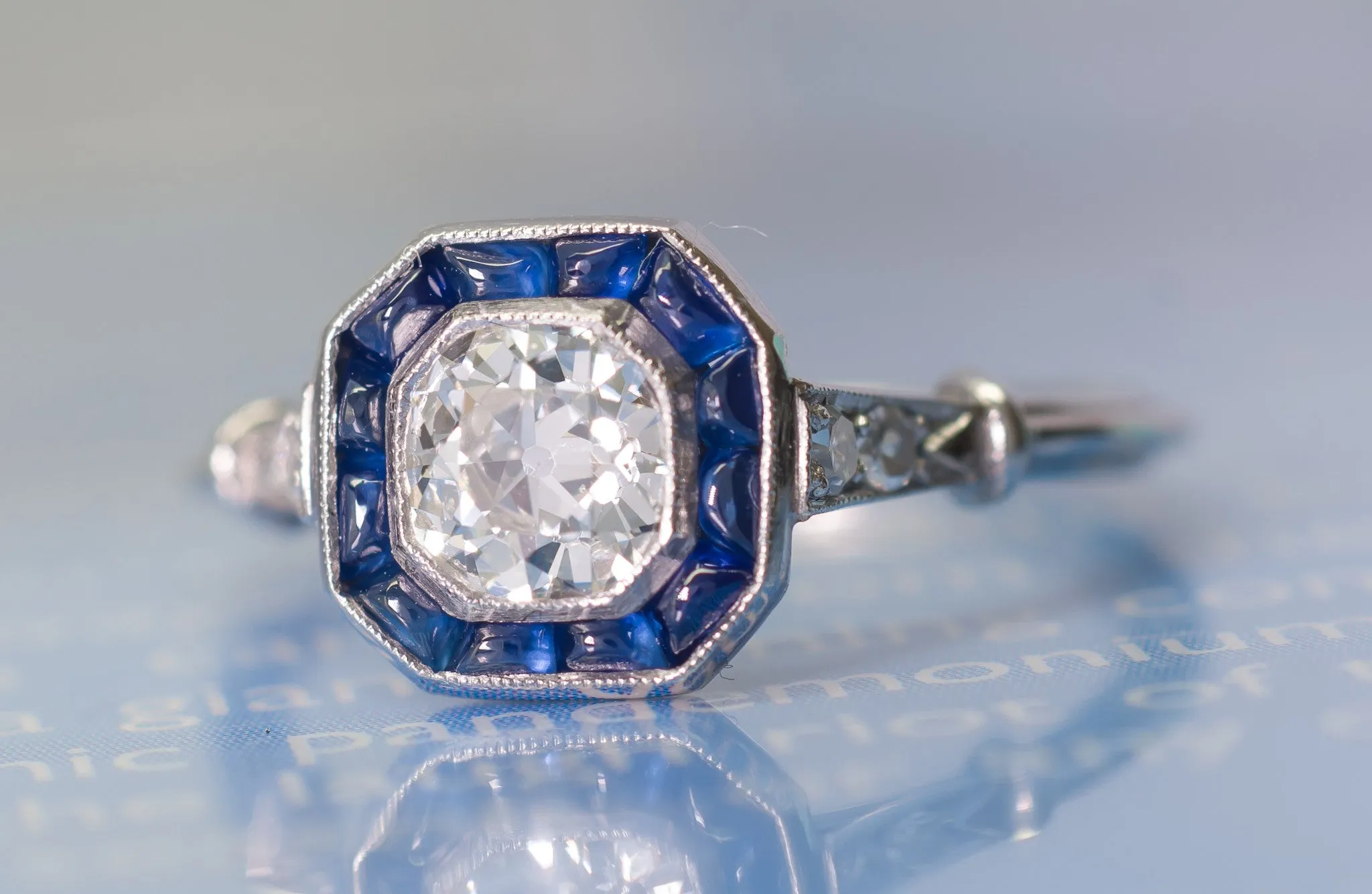 CABOCHON CUT SAPPHIRE AND OLD MINE CUT DIAMOND TARGET RING