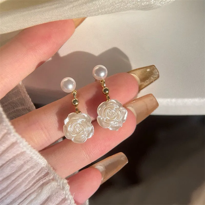 Camellia Flower Pearl Clip on earrings