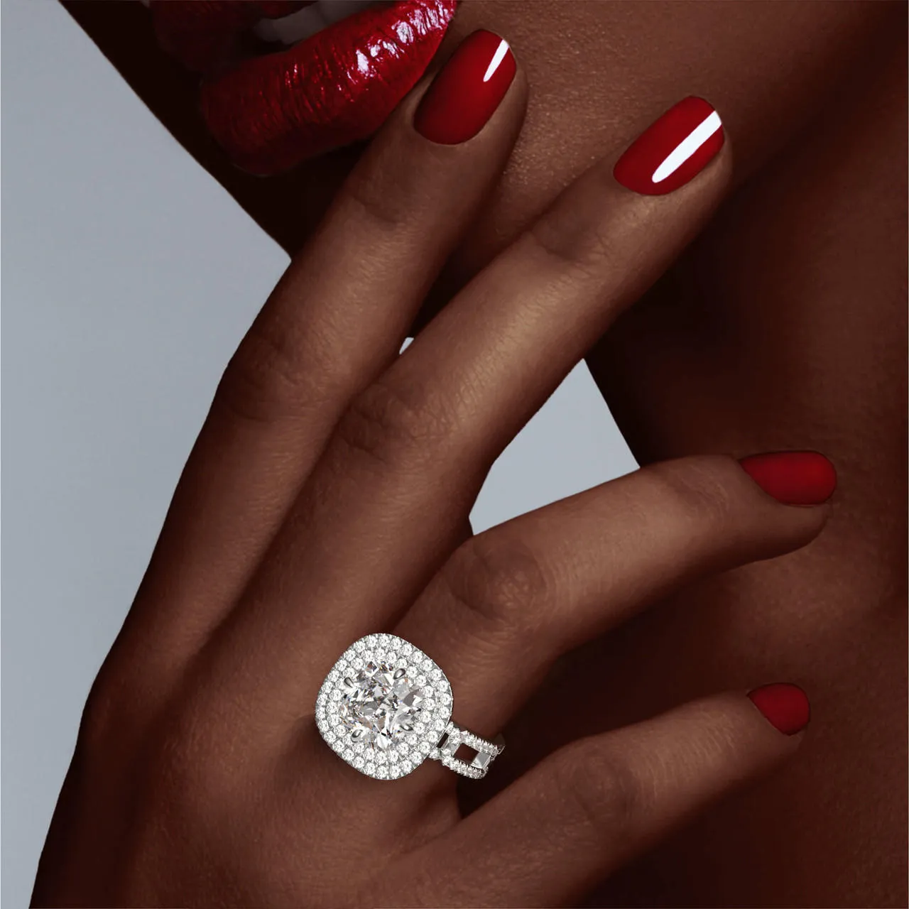 CUSHION CUT DIAMOND ENGAGEMENT RING WITH A DOUBLE HALO 8 PAVE LINKS SETTING IN PLATINUM
