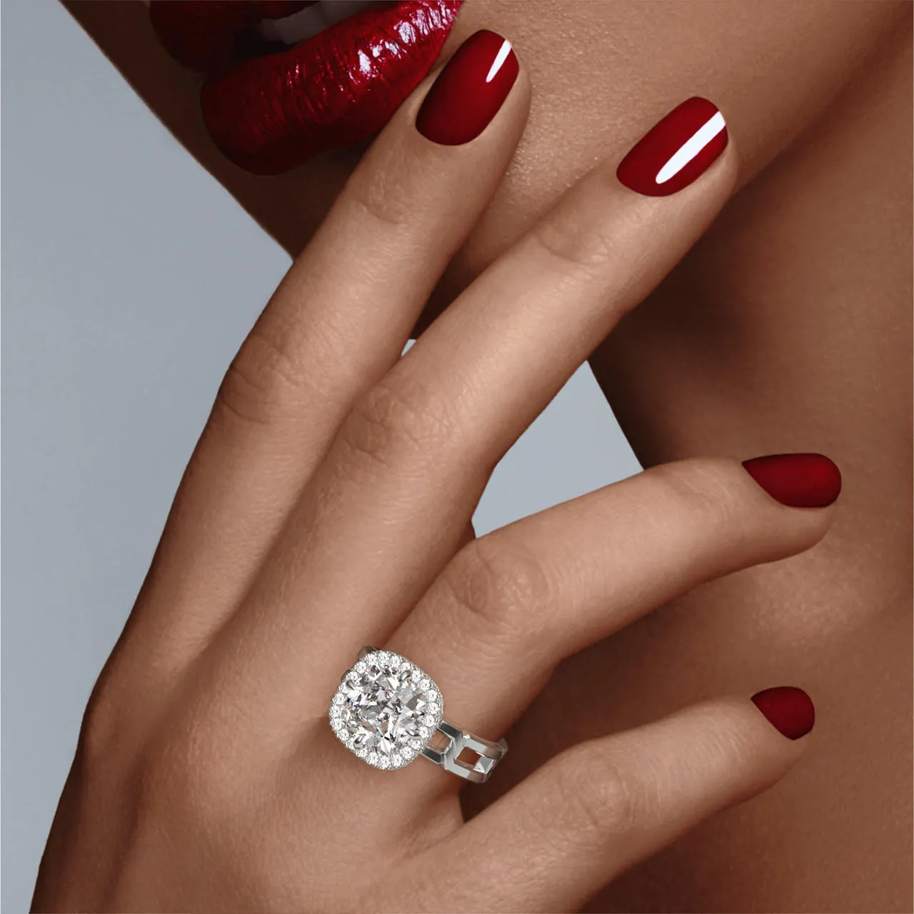 CUSHION CUT DIAMOND ENGAGEMENT RING WITH A WRAPPED HALO 8 LINKS SETTING IN PLATINUM