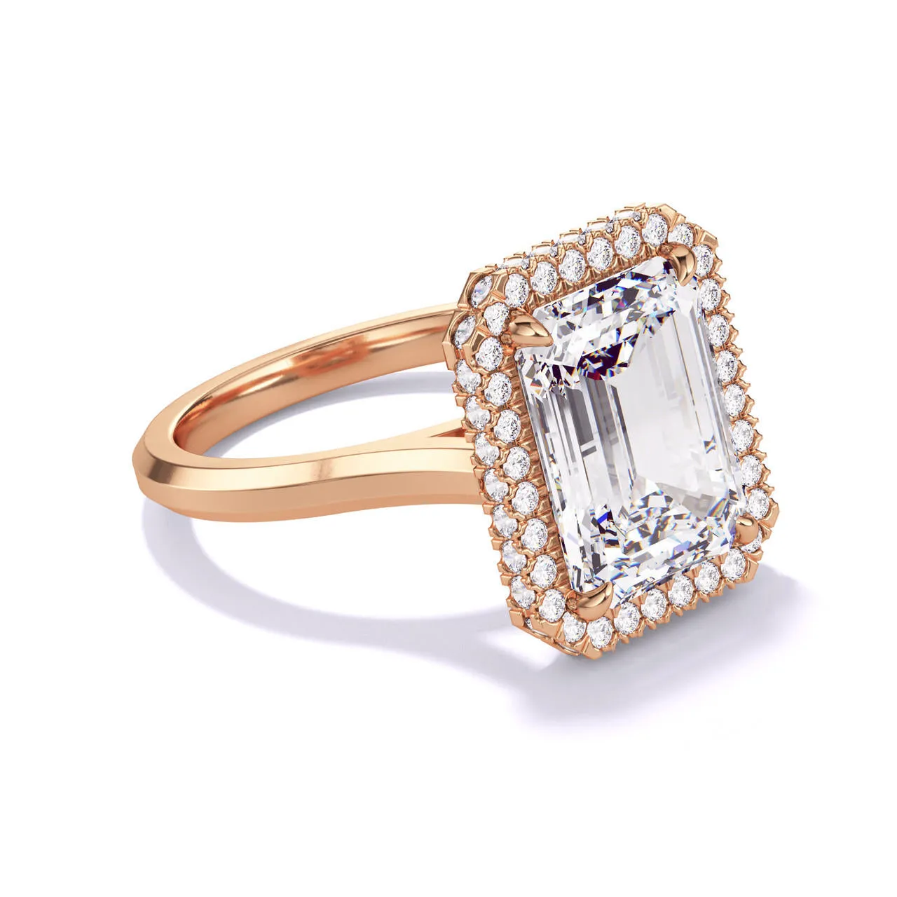 EMERALD CUT DIAMOND ENGAGEMENT RING WITH A WRAPPED HALO THREE PHASES SLIM SETTING IN 18K ROSE GOLD