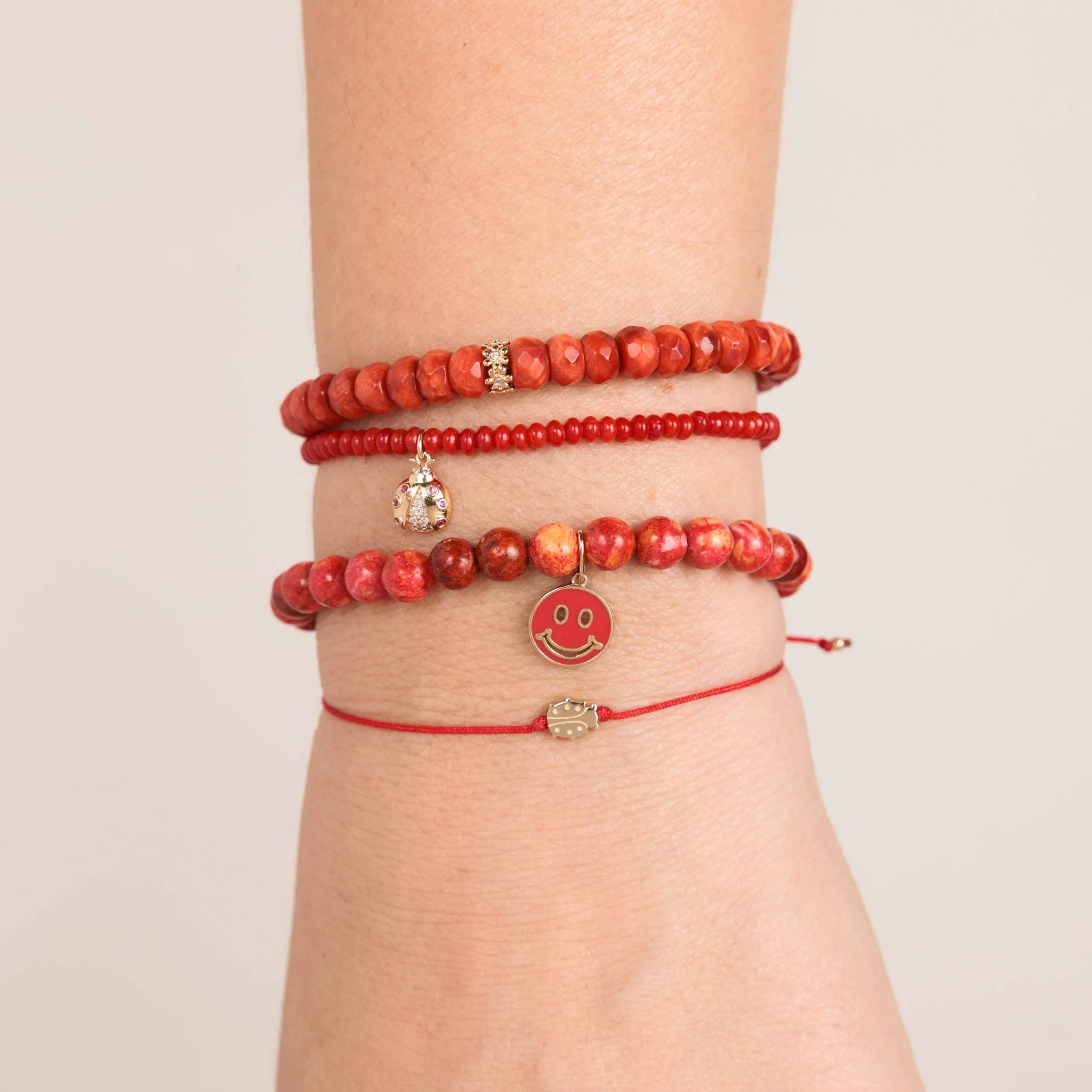 Gold & Diamond Small Ladybug on Red Bamboo Coral