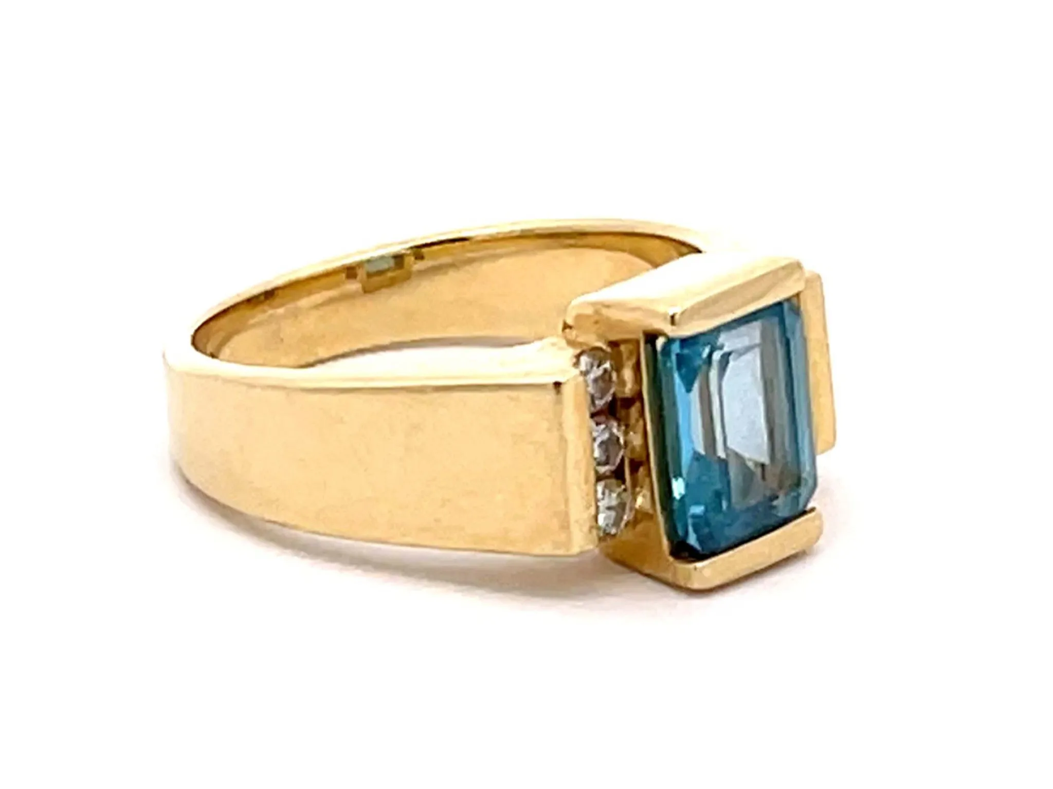 Light Blue Topaz and Diamond Ring in 14k Yellow Gold