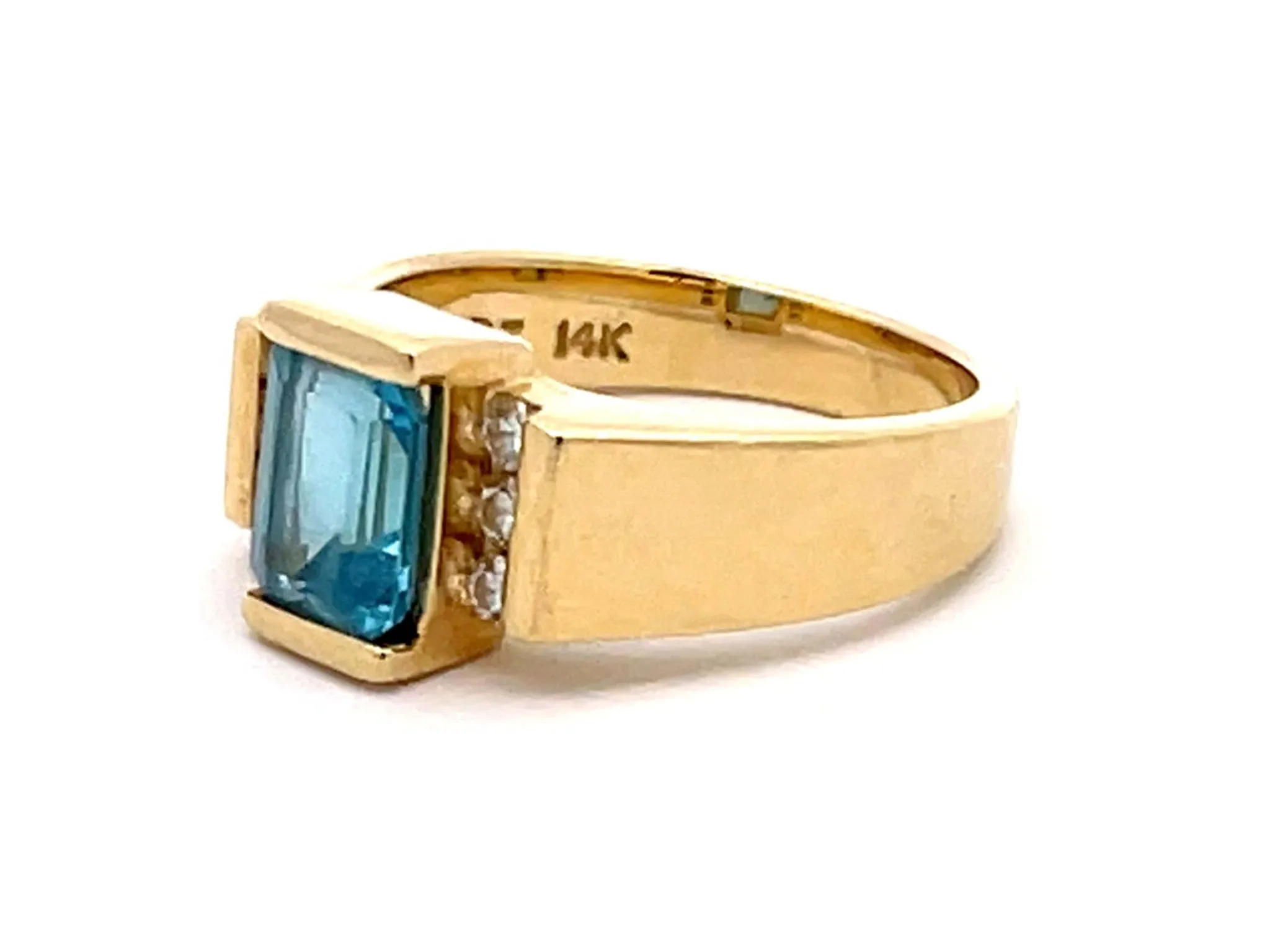 Light Blue Topaz and Diamond Ring in 14k Yellow Gold