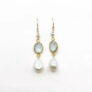 Light Blue Topaz and Pearl set in Gold
