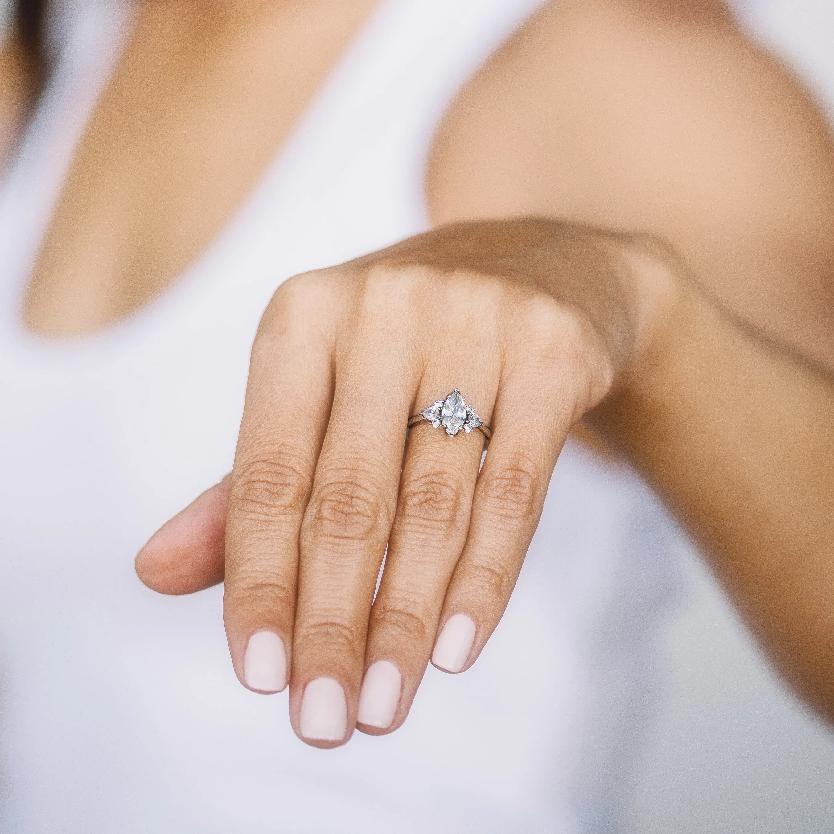 Marquise Solitaire Engagement Ring with Pear and Round Side Diamonds Setting
