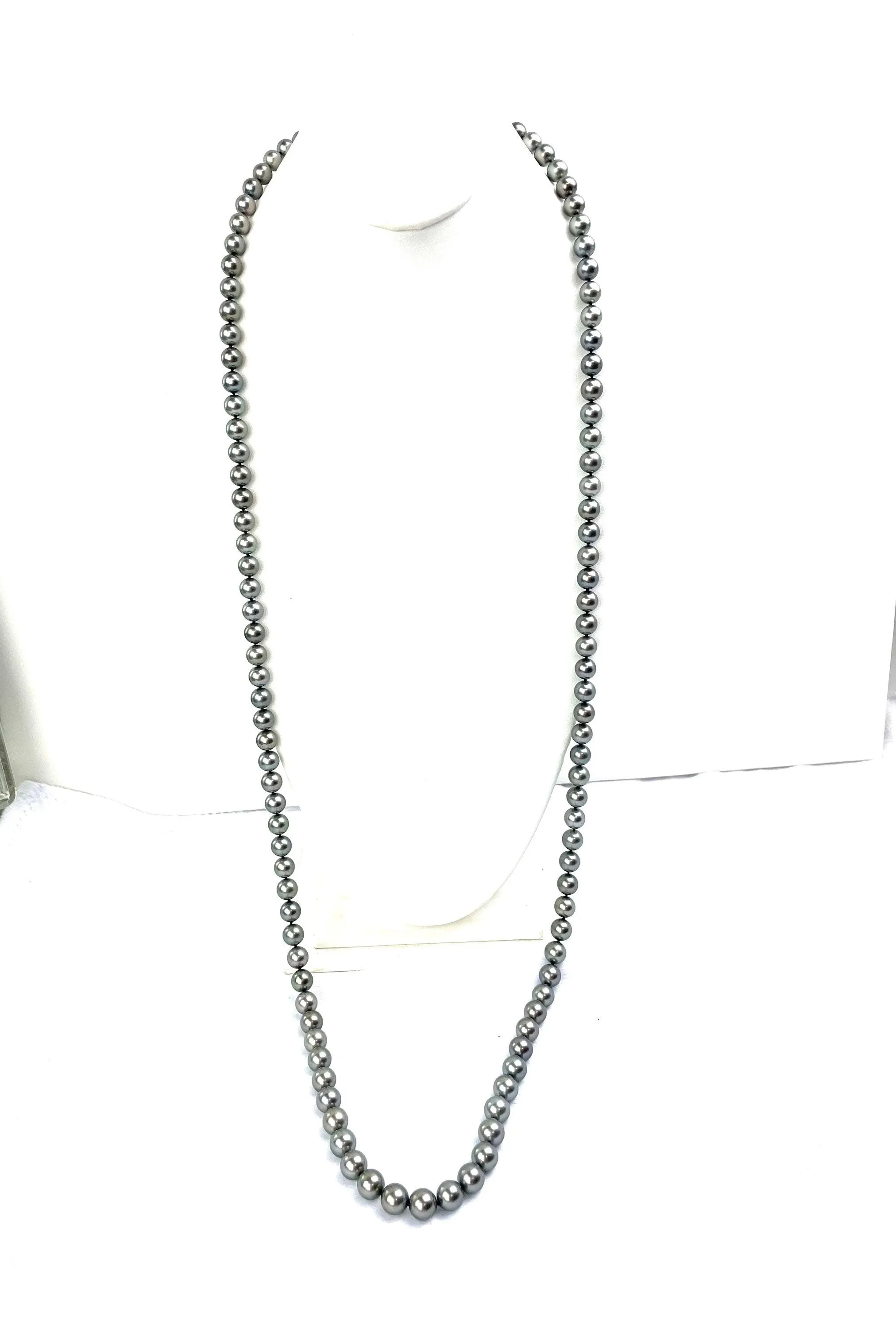 Mikimoto Tahitian Black pearl strand with original box and paperwork
