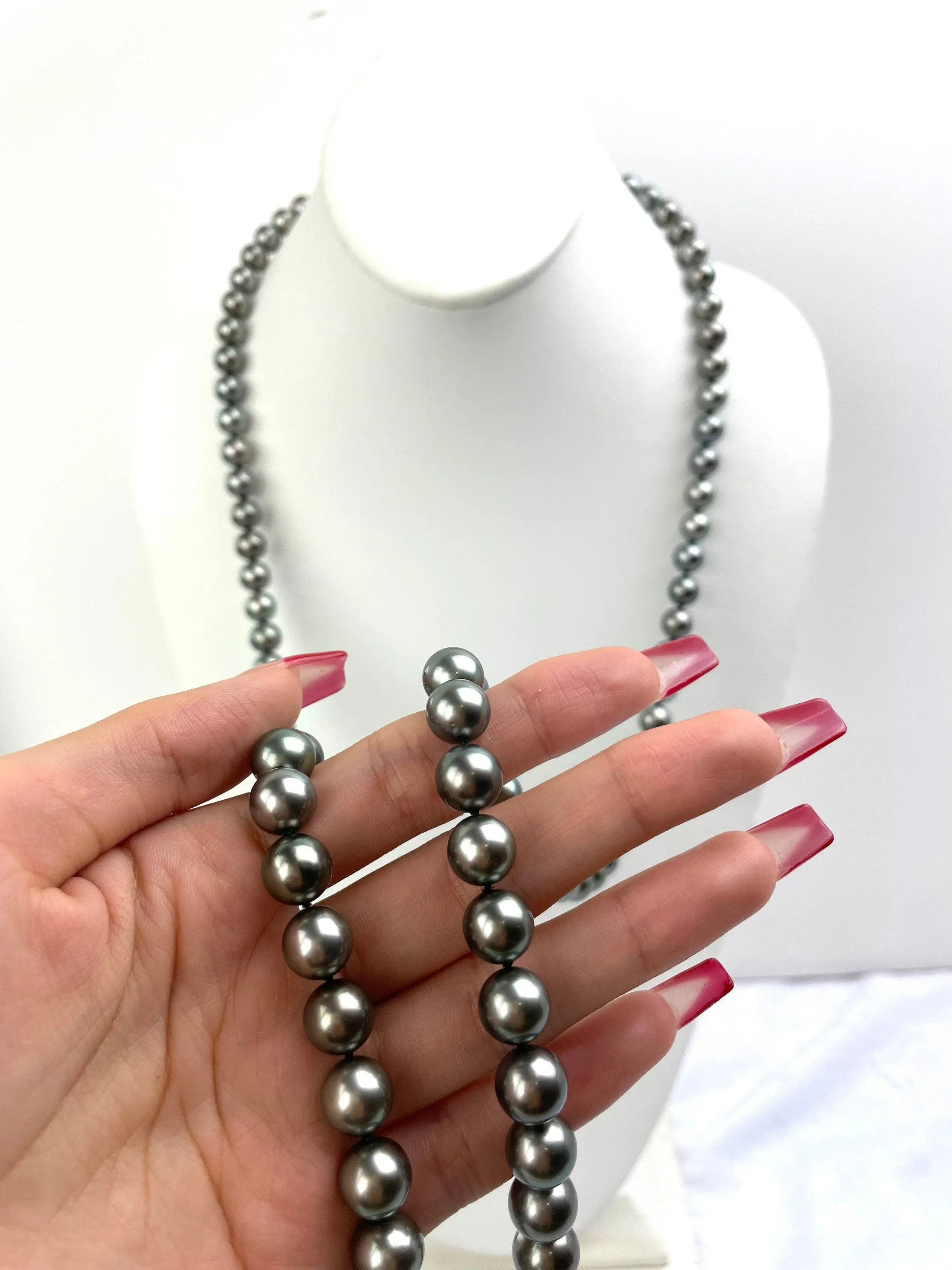 Mikimoto Tahitian Black pearl strand with original box and paperwork