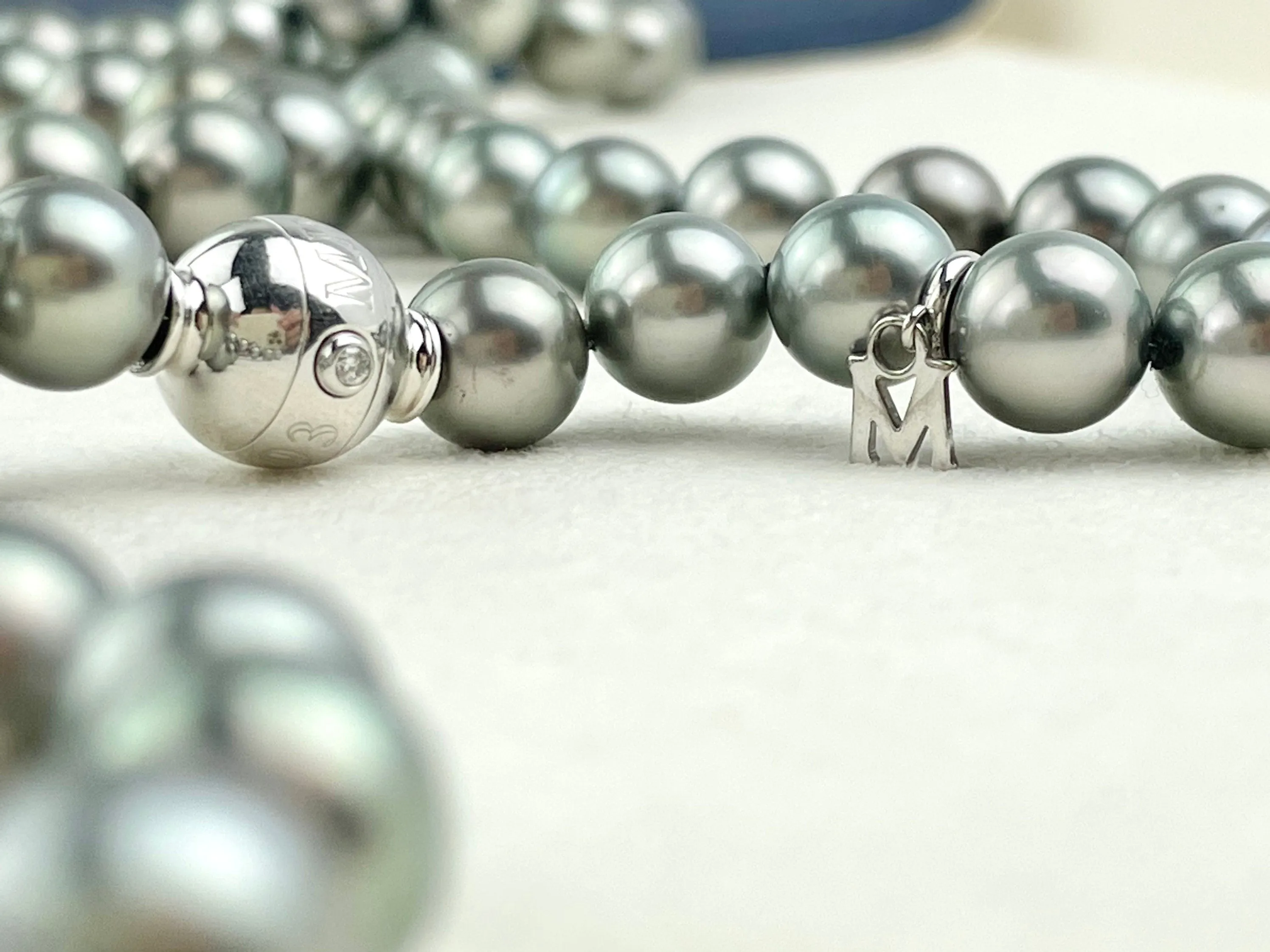 Mikimoto Tahitian Black pearl strand with original box and paperwork