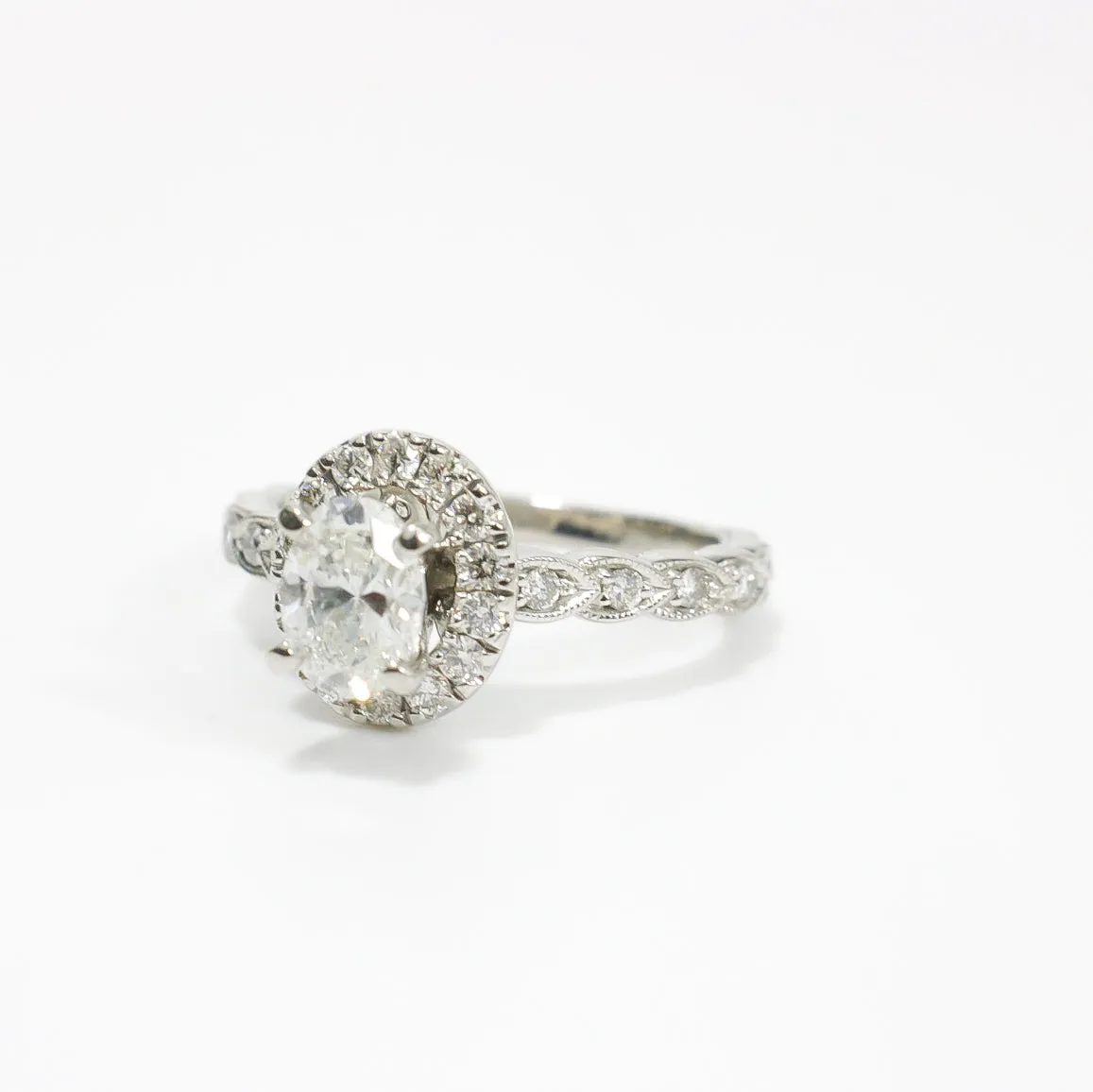 OVAL NATURAL DIAMOND ENGAGEMENT RING