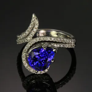 Pear Shape Tanzanite and Diamond Swirl Ring 3.83 Carats Designed by Christopher Michael