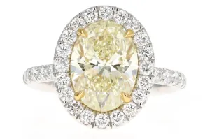 Platinum & 18K Yellow Gold 3.72 Carat Oval Yellow Diamond Halo Engagement Ring GIA Certified