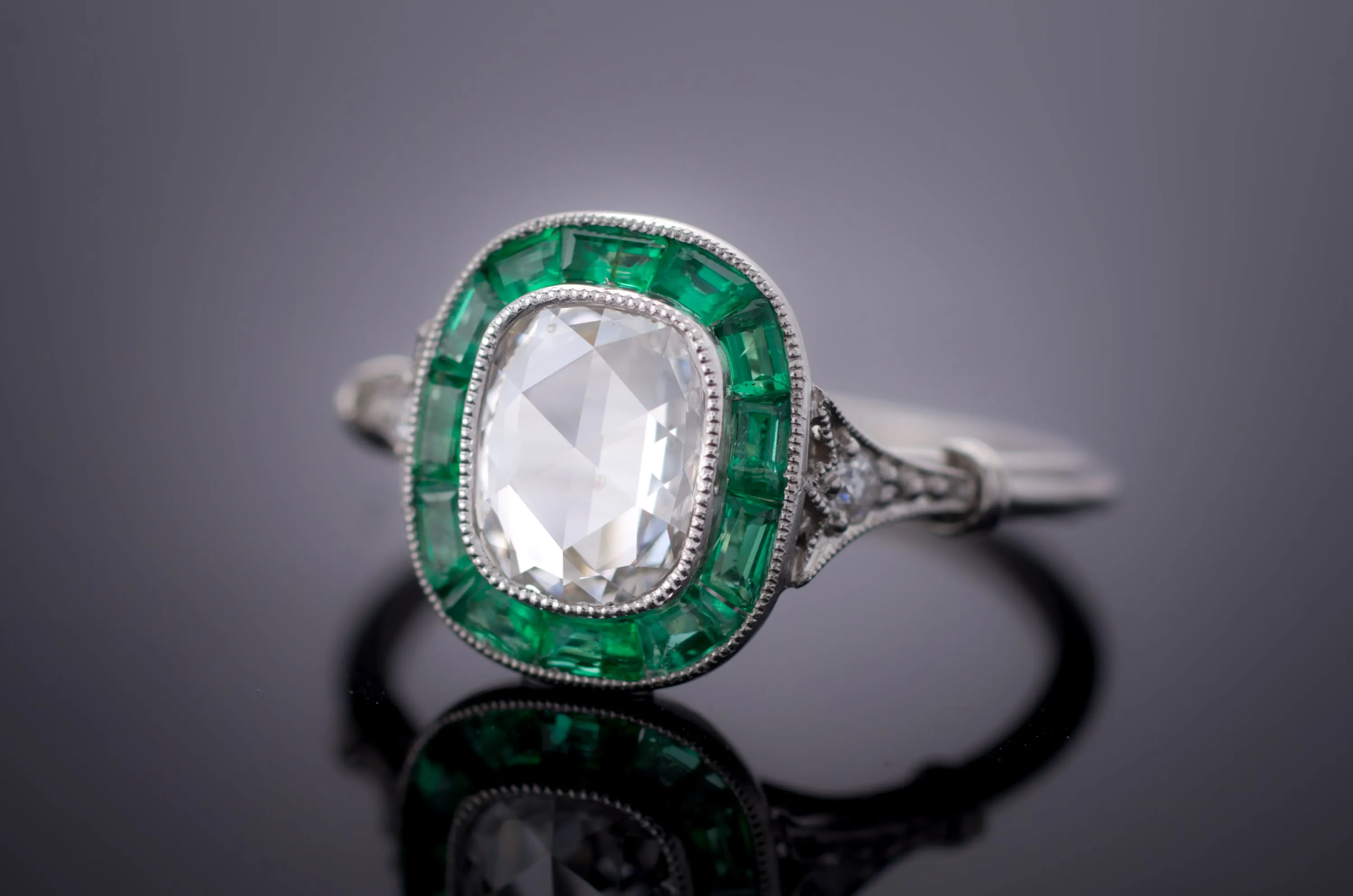 ROSE CUT AND EMERALD TARGET RING