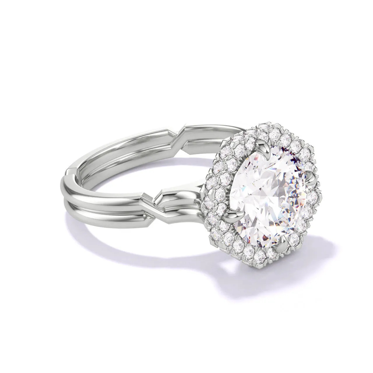 ROUND CUT DIAMOND ENGAGEMENT RING WITH AN OCTAGON HALO CHANCE SETTING IN PLATINUM