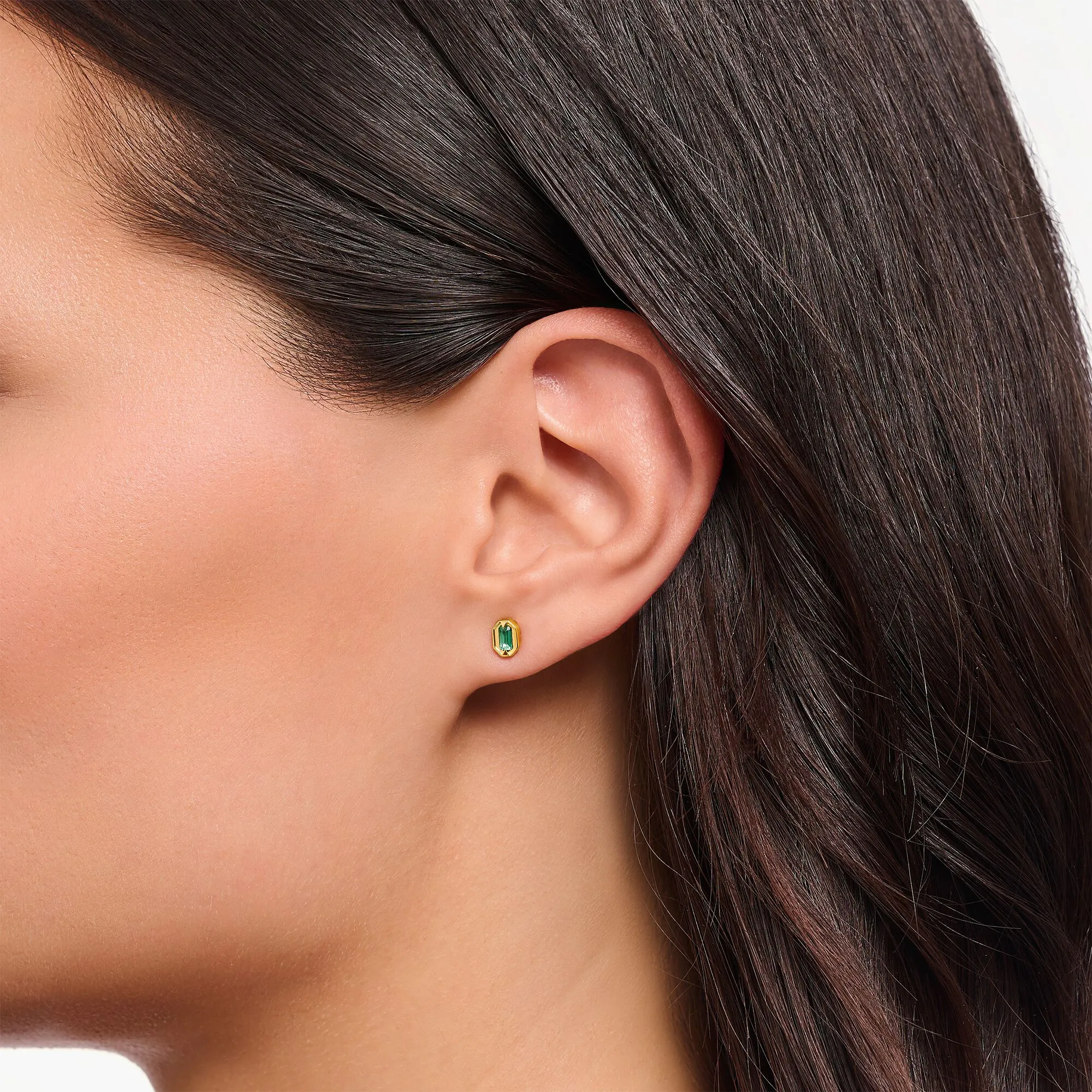 Small ear studs with green stones